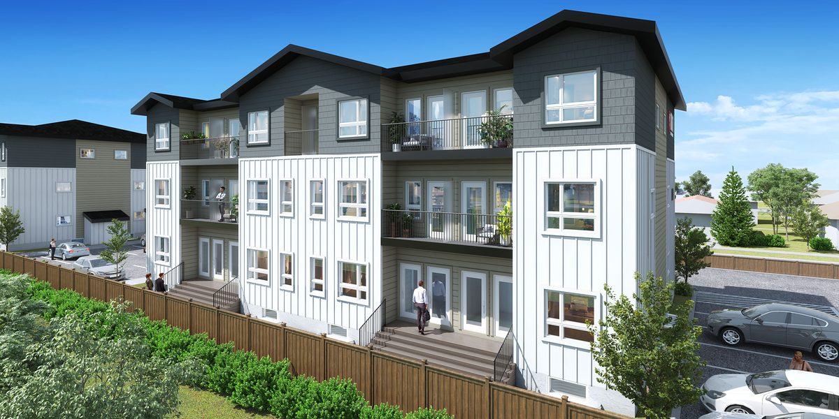 Front entrances of the 16-home building at 1811 John Brebeuf behind a planted fence line