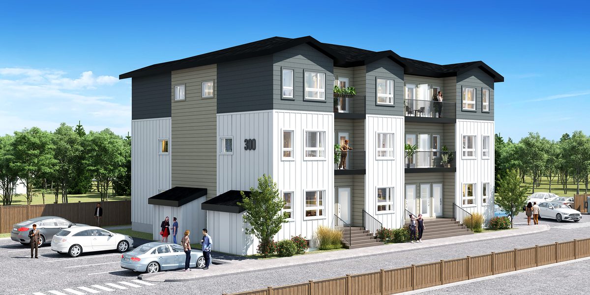 Corner view of a 12-home building at 1811 John Brebeuf, with front steps, landscaping and outdoor parking